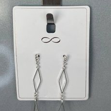 عنوان: گوشواره نقره‌ای بلند مدل "Geometric Dangles"